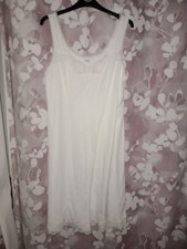 New women's White full length slip size 14/16.  Sleeveless. Lace trim at Neck.