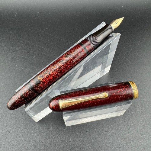 Warranted black red urushi - red,