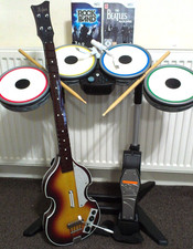 Wii/Wii U BEATLES WIRLESS ROCKBAND DRUM SET, HOFNER BASS GUITAR, GAMES 2xDONGLES