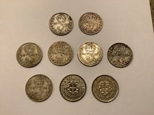 Silver threepence coins (x9)