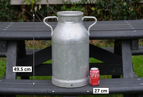 Vintage old aluminium milk