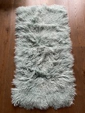 Aqua curly Mongolian lambskin