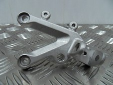 Aprilia RSV RSV4 Tuono 1000 1100 Front left foot hanger bracket 2004 to 2023 NOS