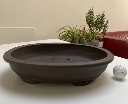 Large new brown unglazed oval - new,