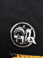 Vintage vauxhall plastic silver finish car grille badge with h a on front