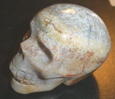 Large agate skull, carved moss
