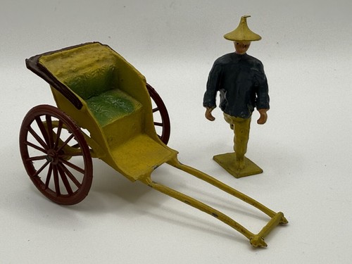 Metallic rickshaw and man - metallic,
