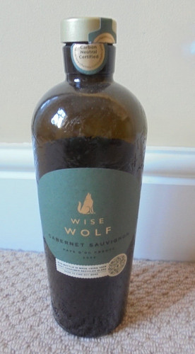 Empty wise wolf wine bottle - empty,