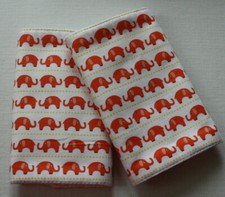 BABY CARRIER DRIBBLE/SUCK