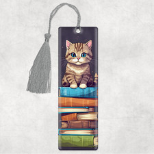 Tabby Cat sitting on books