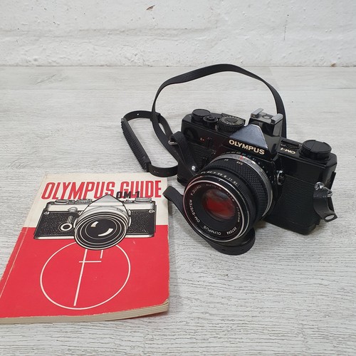 Olympus 35mm film camera - om-1,