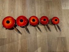 Le Creuset Volcanic Orange 5 Piece Enameled Cast Iron Pan Set With Lids