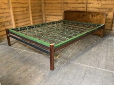 Inland walnut double bed with folding mattress base and bars