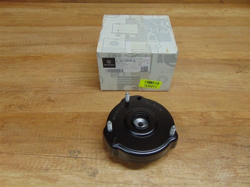 Front spring retainer genuine - front,