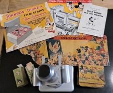 Johnson-Disney 5  Film Strips And Projector Untested.