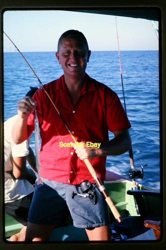 Man deep sea fishing - deep, boat