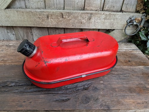 Vintage red metal petrol can - vintage,