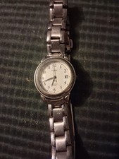 Timex Indiglo silver coloured, metal, ladies watch.  Works, winder missing.