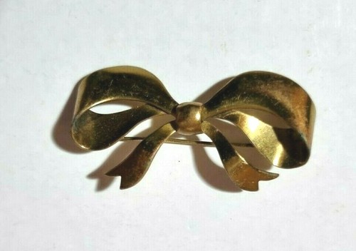 Bow brooch brass golden - brass/,