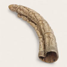 Hand-carved wild boar tusk