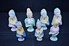 SEVEN VINTAGE PIN CUSHION PORCELAIN HALF DOLLS (1)