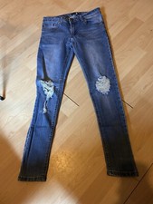 Ladies Ripped Skinny Jeans