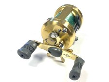 Shimano Calcutta 400 multiplier sea reel with gold finish plus optional check