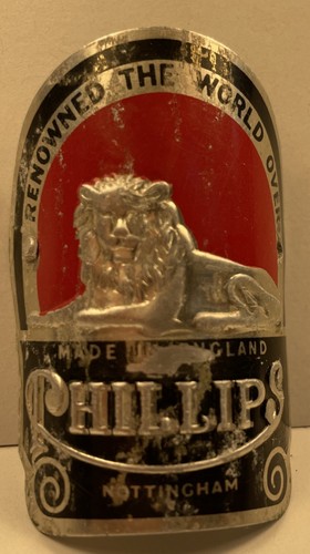Phillips head badge - head,