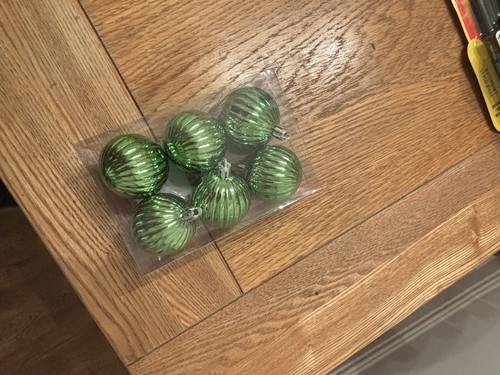 Green christmas baubles - green,