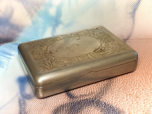 Engraved silver tone