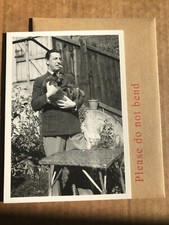 Paul Nash Holding Posh Back