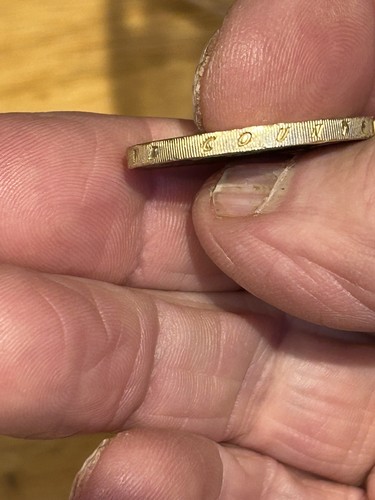 Edge enscription pound coin - edge, 2