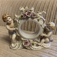 Quality Vintage Cherub mantle clock  body in fine Porcelain 
