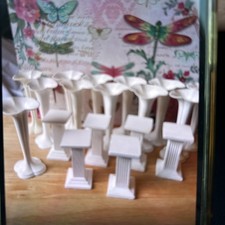 Cake decorating pillars 18 white two designs. 12 plastic pillars