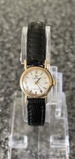 OMEGA LADYMATIC 9 CARAT GOLD WATCH.