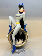 Batgirl on Bat-Signal, DC