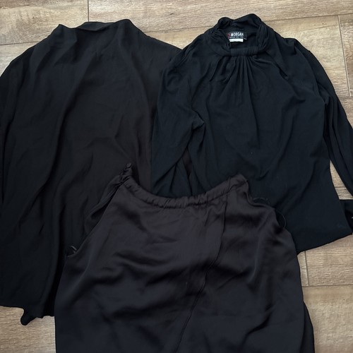 Three women black going - three,