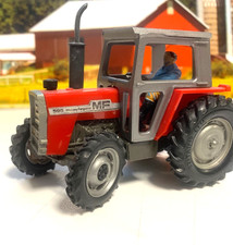 BRITAINS.1:32.FARM.MASSEY FERGUSON 595. 4 WHEEL DRIVE.  4x4 TRACTOR.CAB,DRIVER