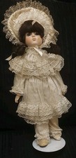 Porcelain Doll With Bonnet And