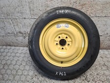 Space saver wheel with - space,