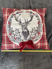 tartan stag cushion. Has only sat on the spare bed 40 X 40cm