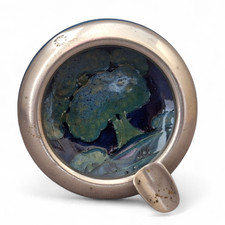 A  MOORCROFT ASHTRAY IN THE SORT AFTER MOONLIT BLUE PATTERN