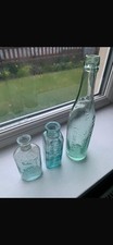 Three Vintage Glass Bottles