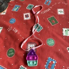 Popper Toy On Necklace