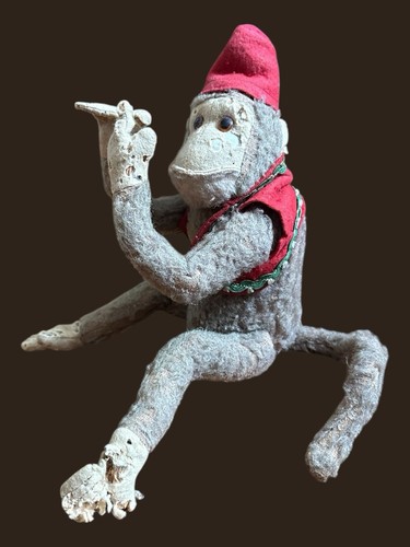 Old straw filled monkey - straw,