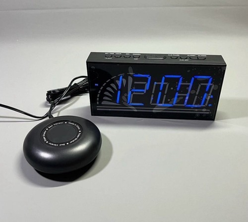 Loud alarm clock vibration - clock, bed