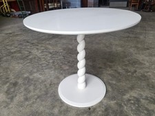 Small cream round occasional