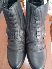 mountain horse boots,  size 8 ,never warn too big ,colour black