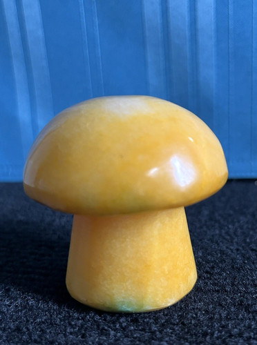Yellow carved polished stone - yellow,