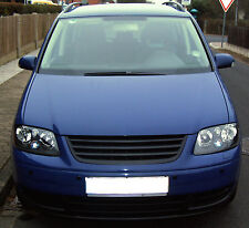 Badgeless debadged grille